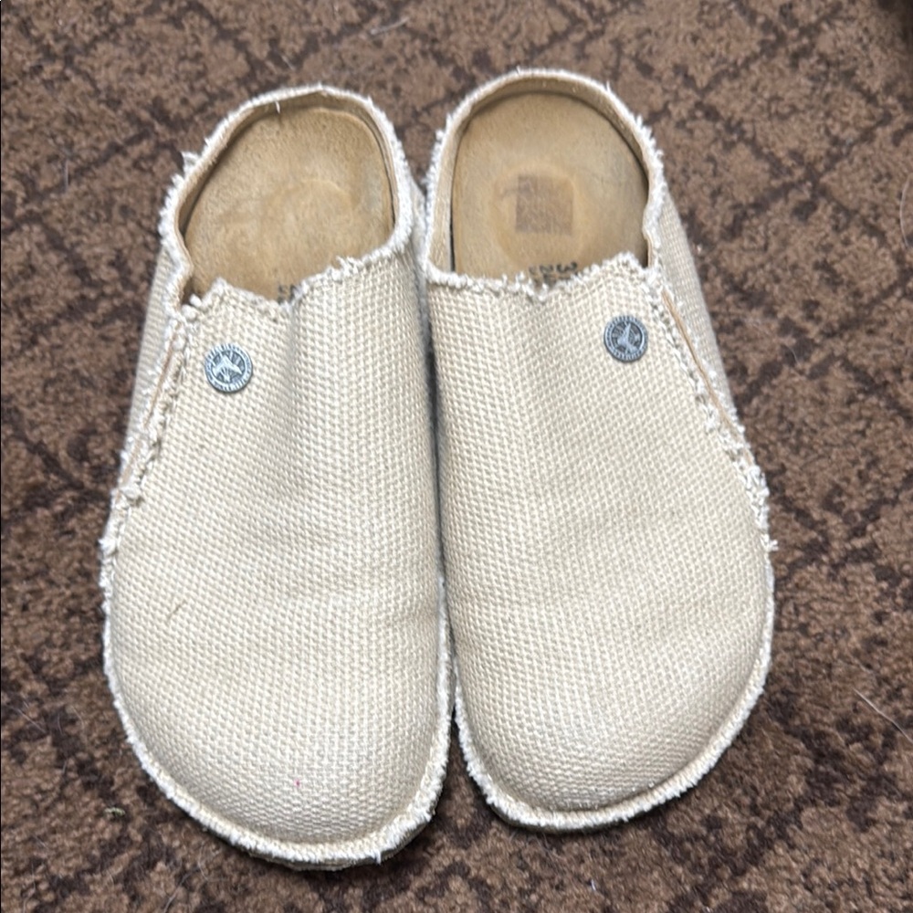 Birkenstock Cream Slippers with Open Heel and Textured Fabric